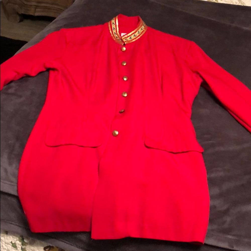 Red blazer with gold trim and skirt